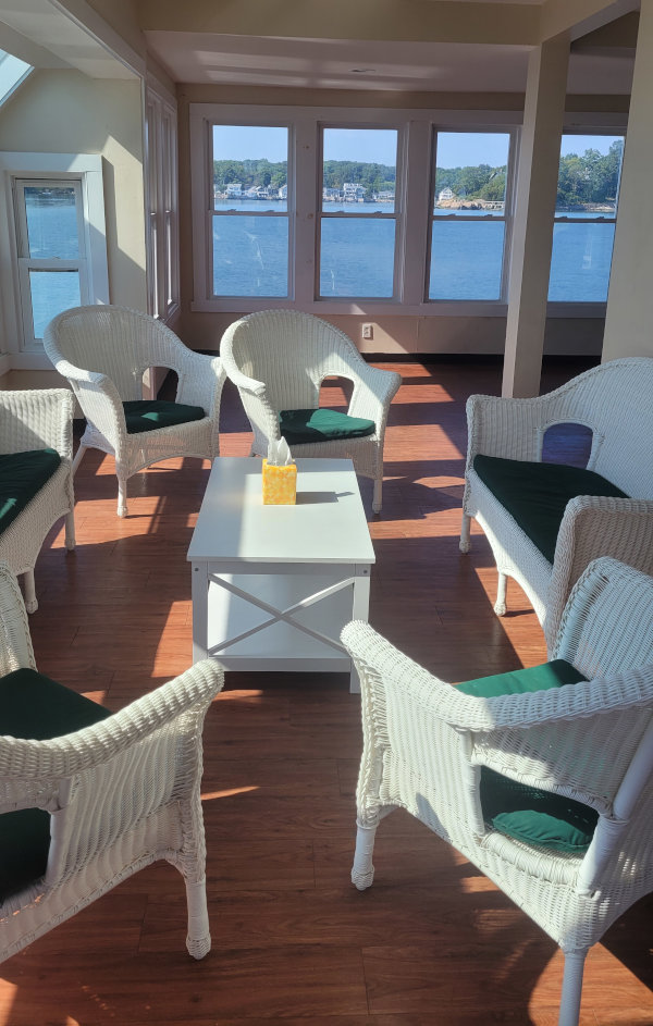 Killam's Point meeting room with chairs and ocean view