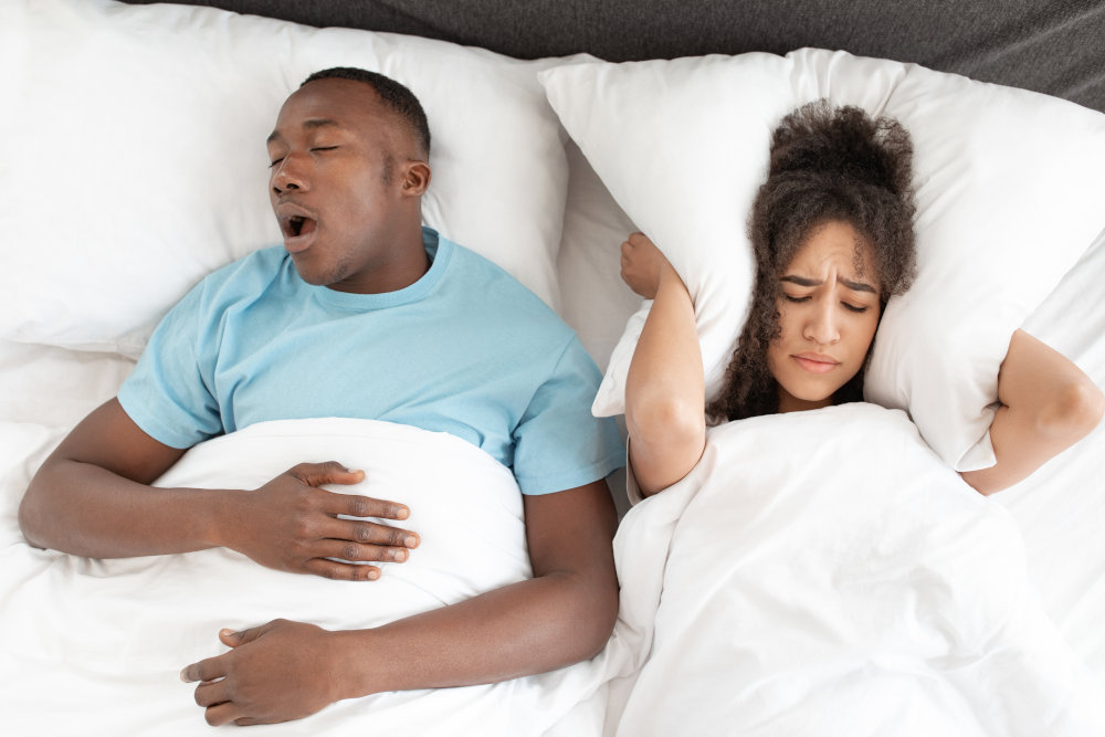 Man with neurological sleep apnea keeps his spouse awake because of snoring